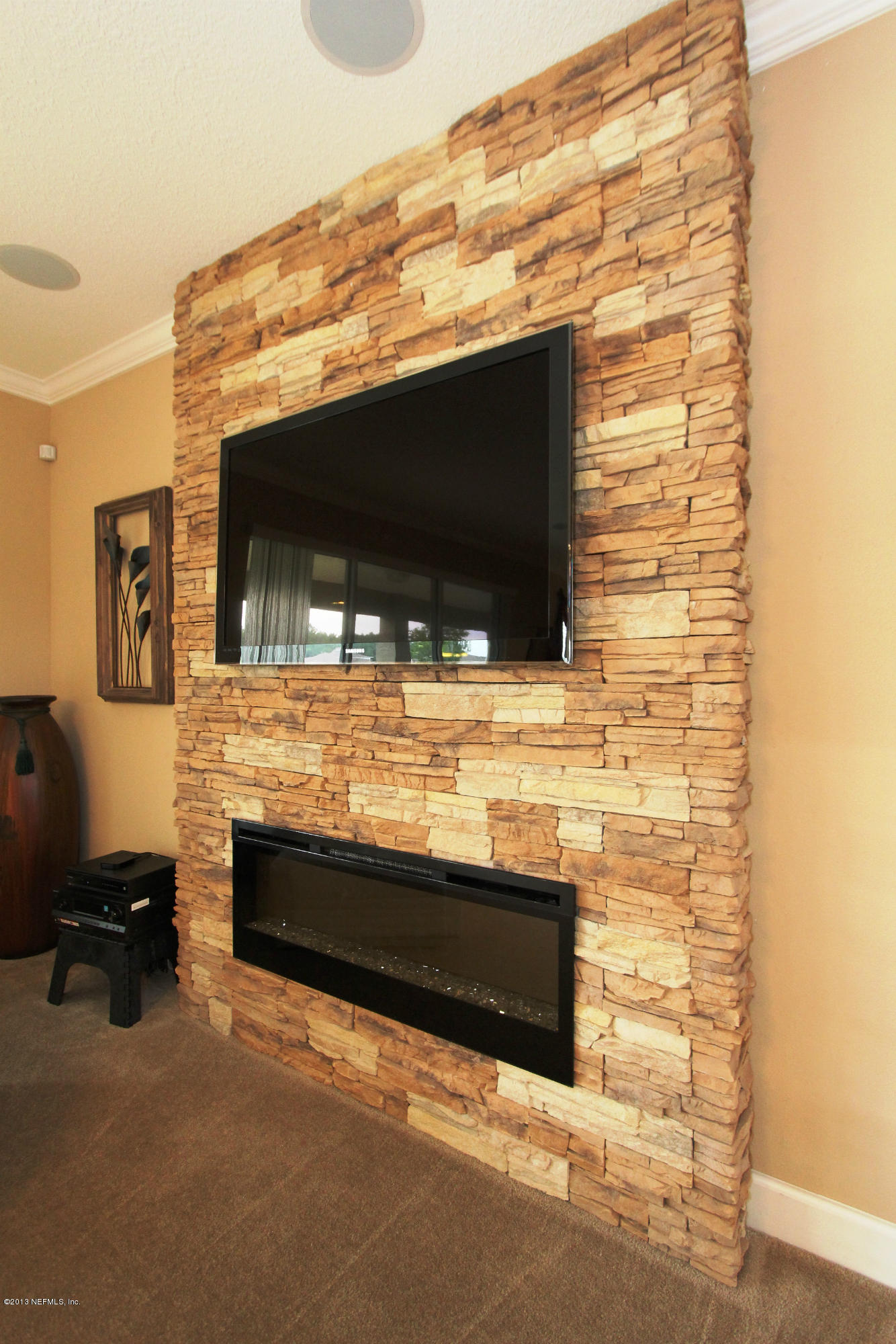 732 Castledale Court Jacksonville, FL 32259 - Photo 17 of 50 a view of living room with a flat screen tv
