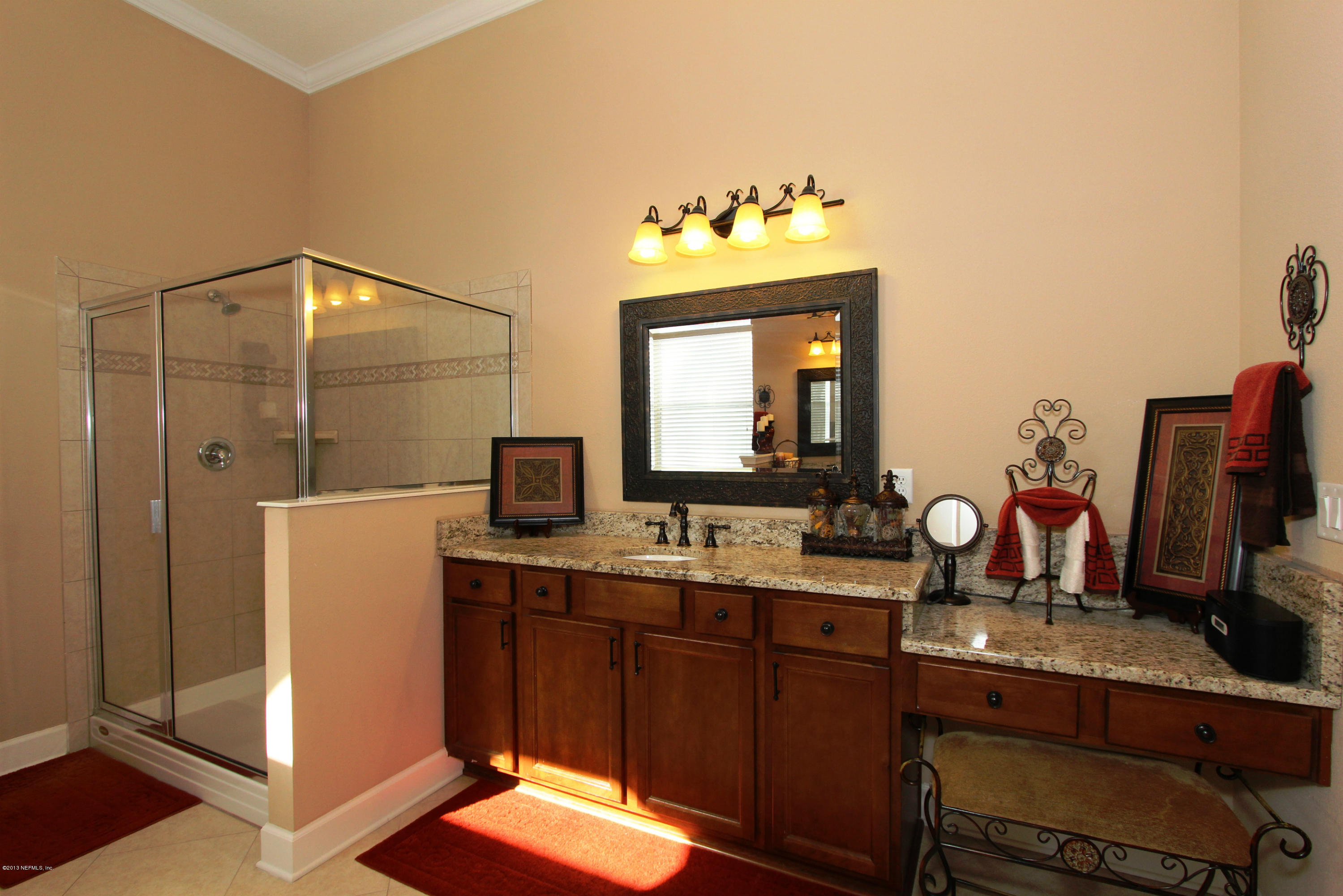 732 Castledale Court Jacksonville, FL 32259 - Photo 28 of 50 a bathroom with a double vanity sink and a mirror