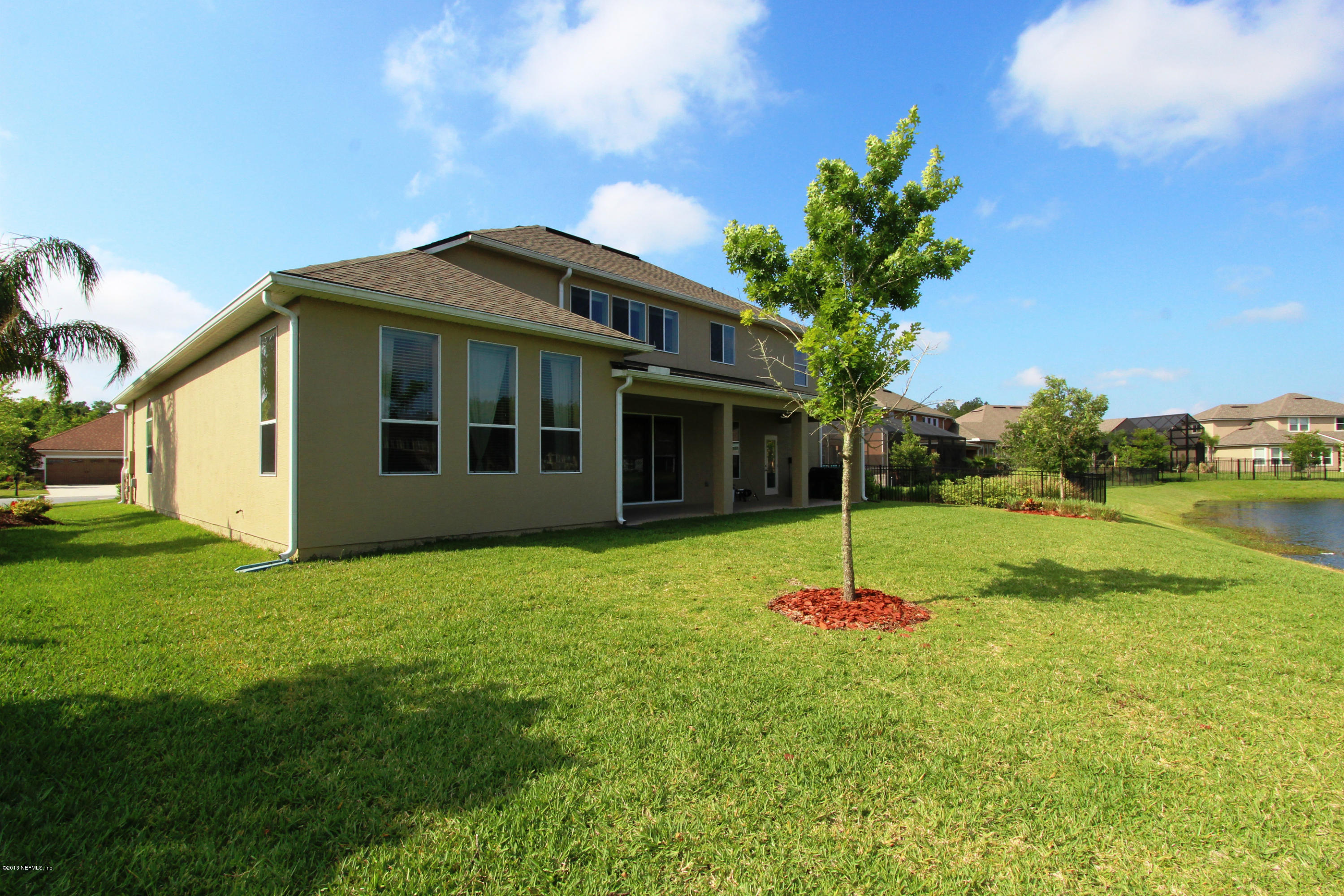732 Castledale Court Jacksonville, FL 32259 - Photo 50 of 50 a house with garden in front of it