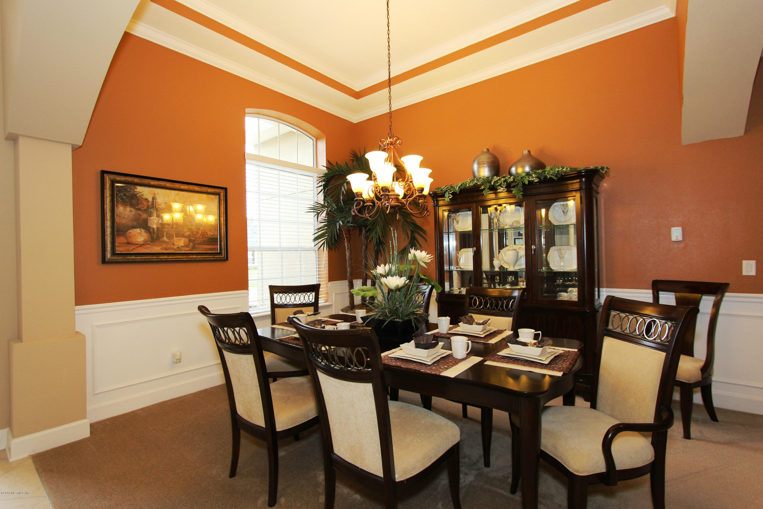 732 Castledale Court Jacksonville, FL 32259 - Photo 8 of 50 a view of a dining room with furniture and chandelier