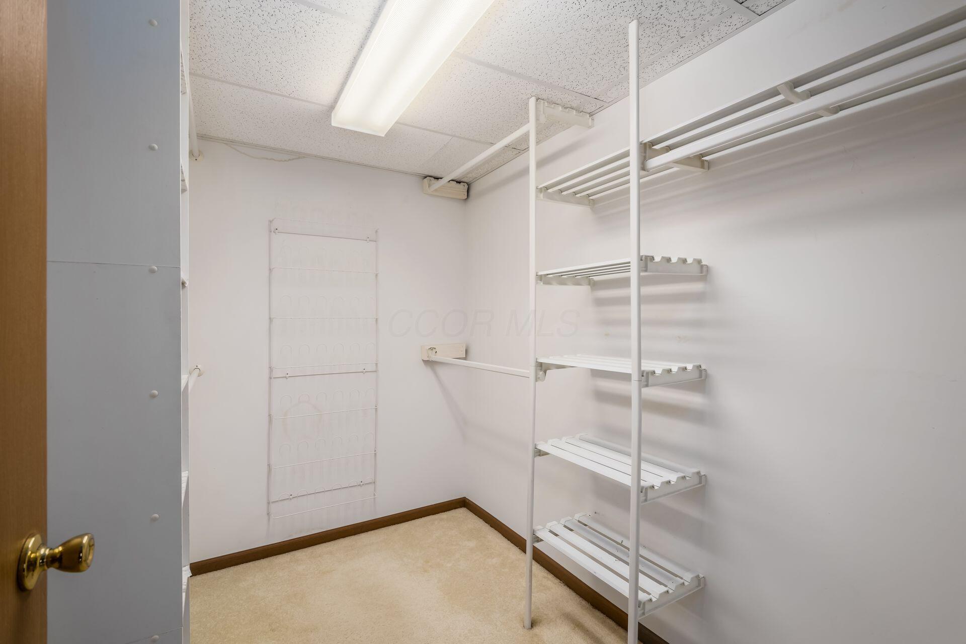 5885 Beechcroft Road, Unit 114 Columbus, OH 43229 - Photo 22 of 31 Primary Suite Closet