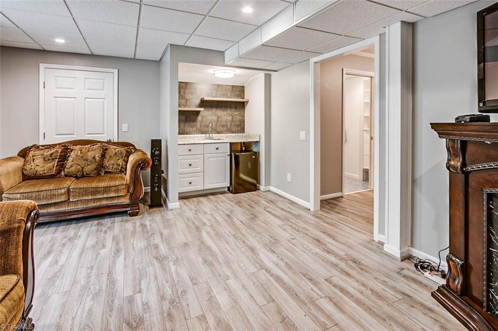 1449 New Salem Road Randleman, NC 27317 - Photo 24 of 30 Basement room with wet bar