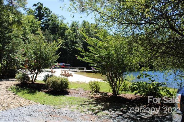 0 Melrose Mountain Road, Unit 506 Tryon, NC 28782 - Photo 7 of 9 a view of a yard with plants and large trees