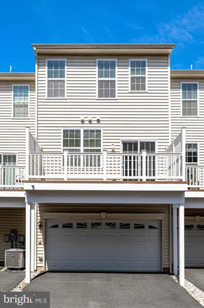 a view of a building with a yard