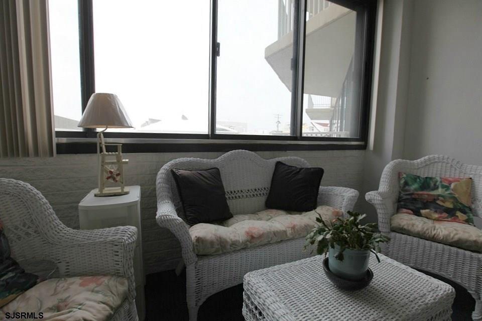 111 South 16th Avenue, Unit 312 Longport, NJ 08403 - Photo 7 of 14 a living room with furniture flowerpot and window