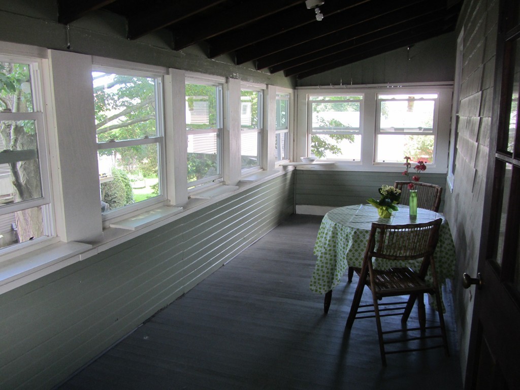 253 Sycamore Street, Unit 253 Watertown, MA 02472 - Photo 14 of 16 a living room with furniture and a large window