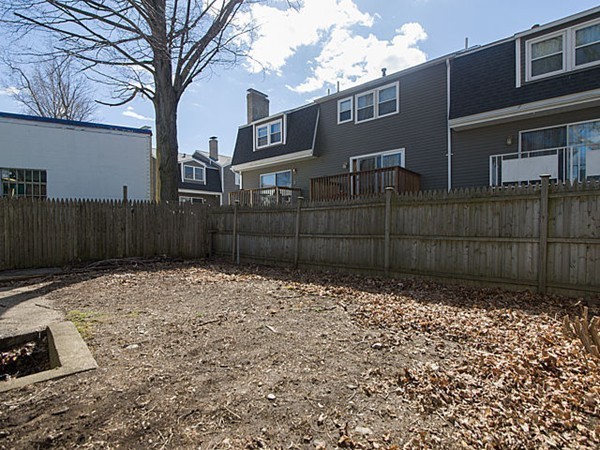 253 Sycamore Street, Unit 253 Watertown, MA 02472 - Photo 16 of 16 a backyard of a house