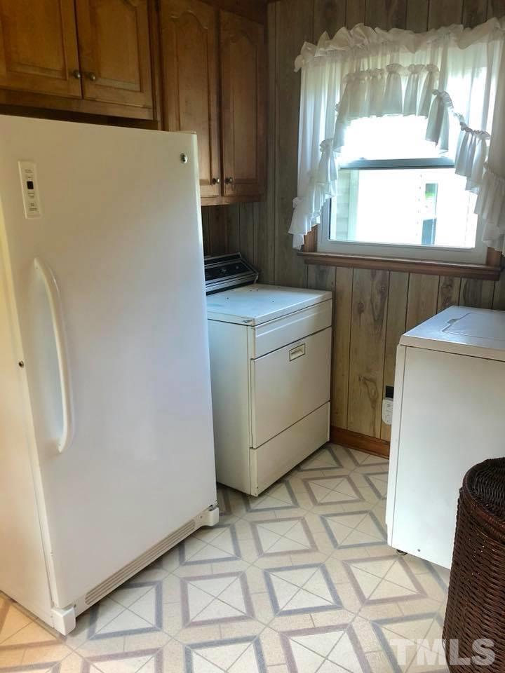 2604 Burlington Road Roxboro, NC 27574 - Photo 17 of 17 a utility room with dryer and washer