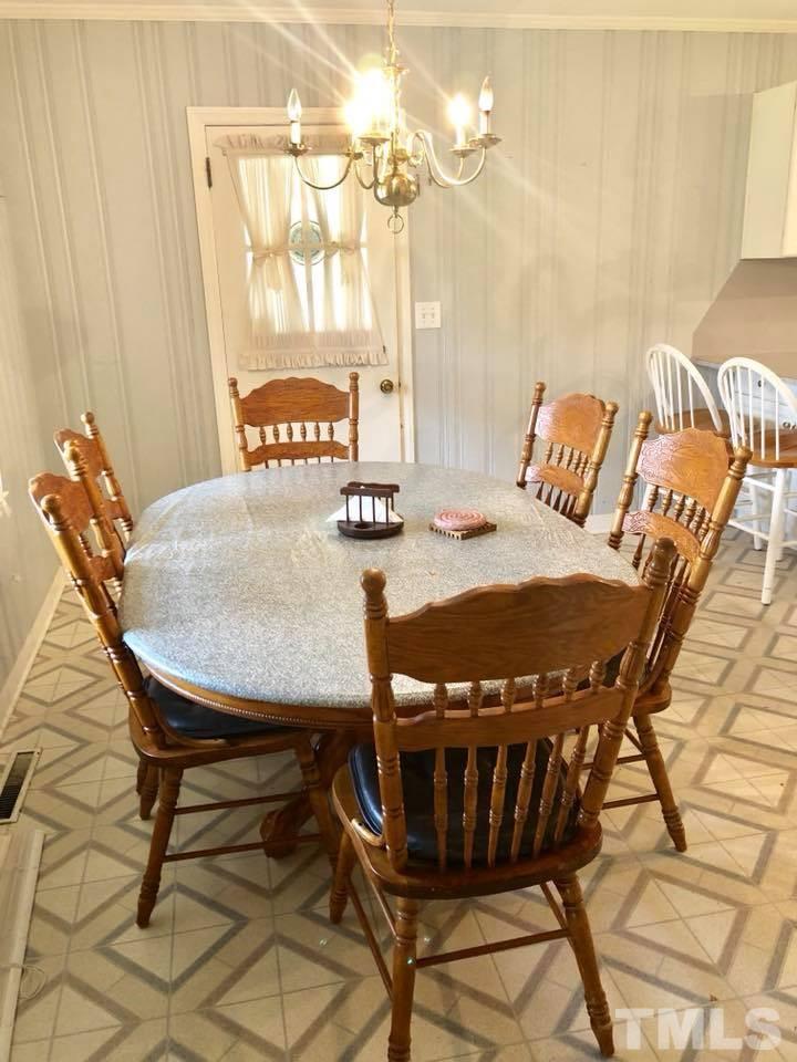 2604 Burlington Road Roxboro, NC 27574 - Photo 8 of 17 a view of a dining room with furniture