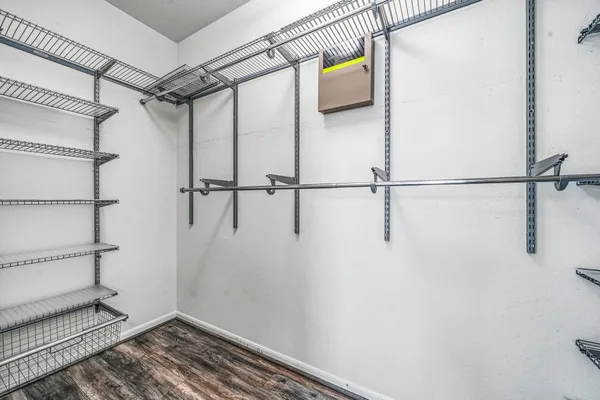 a view of a room with racks on the wall