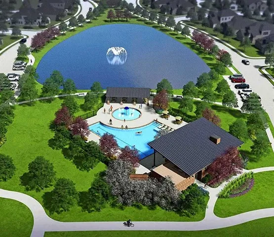 an aerial view of a house with garden space and street view