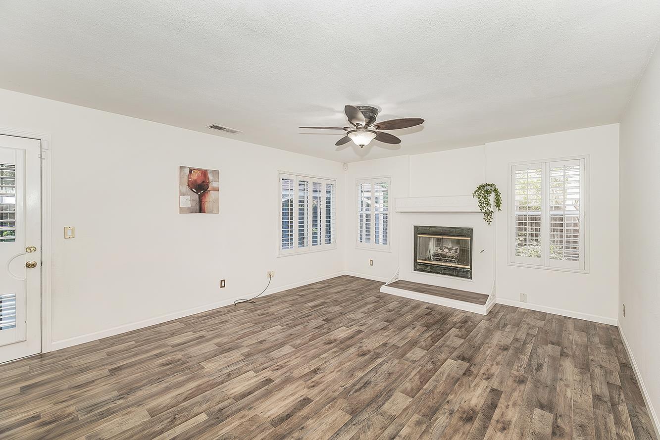 837 East Buckhill Road Fresno, CA 93720 - Photo 7 of 55 Family Room with cozy gas fireplace