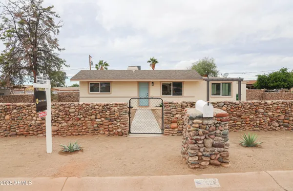 front view of house with a yard