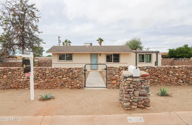 front view of house with a yard