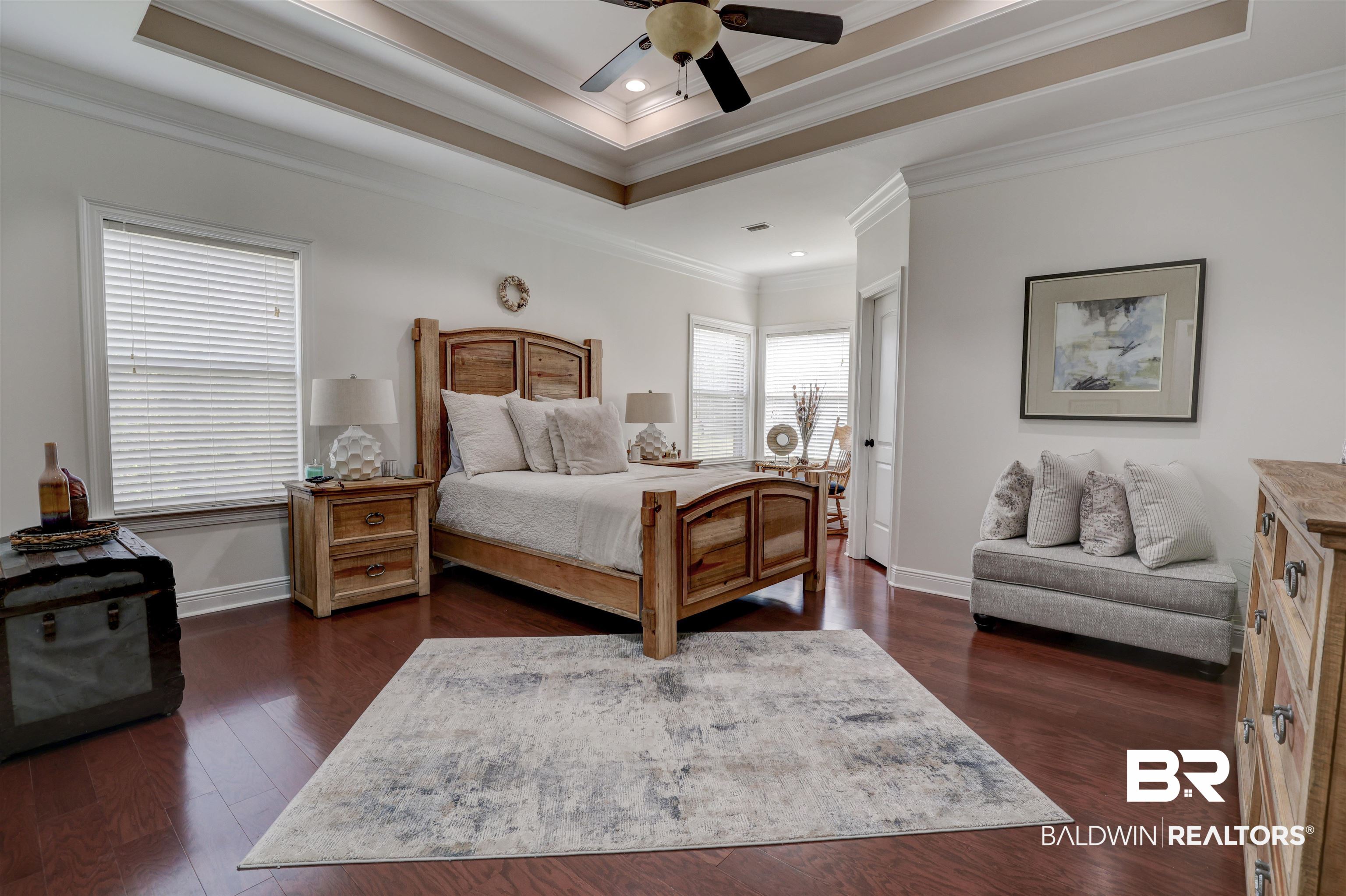 5565 Dawes Lane Theodore, AL 36582 - Photo 16 of 38 Bedroom featuring crown molding and a tray ceiling
