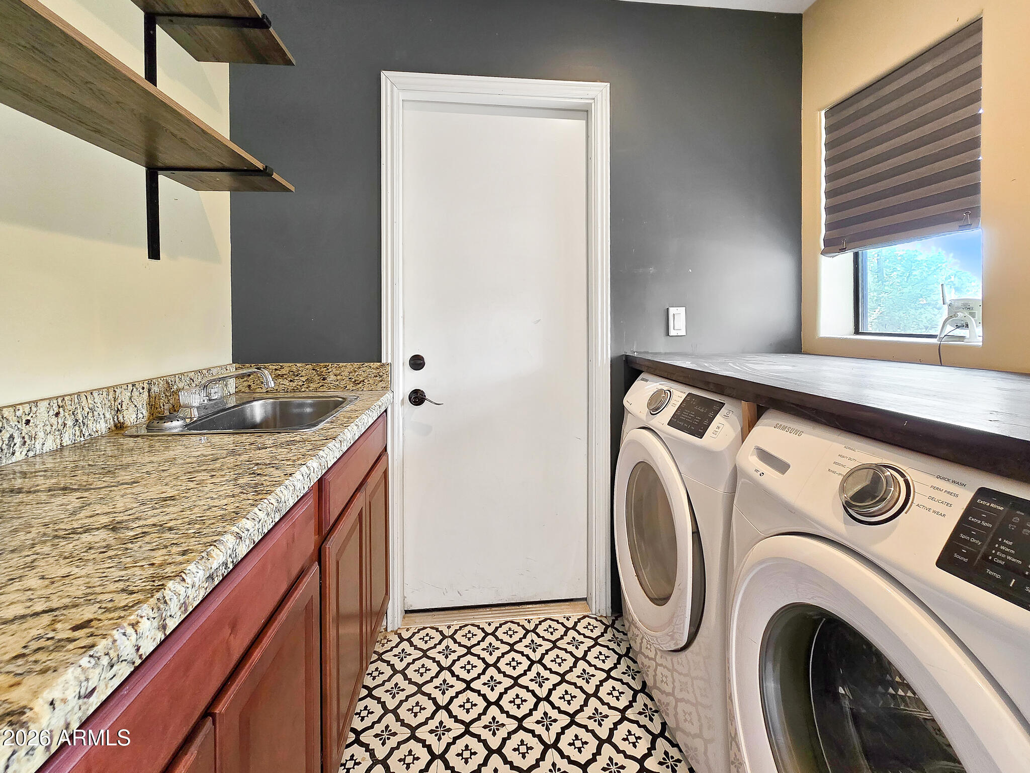 1832 West Northview Avenue Phoenix, AZ 85021 - Photo 10 of 17 a utility room with dryer and washer