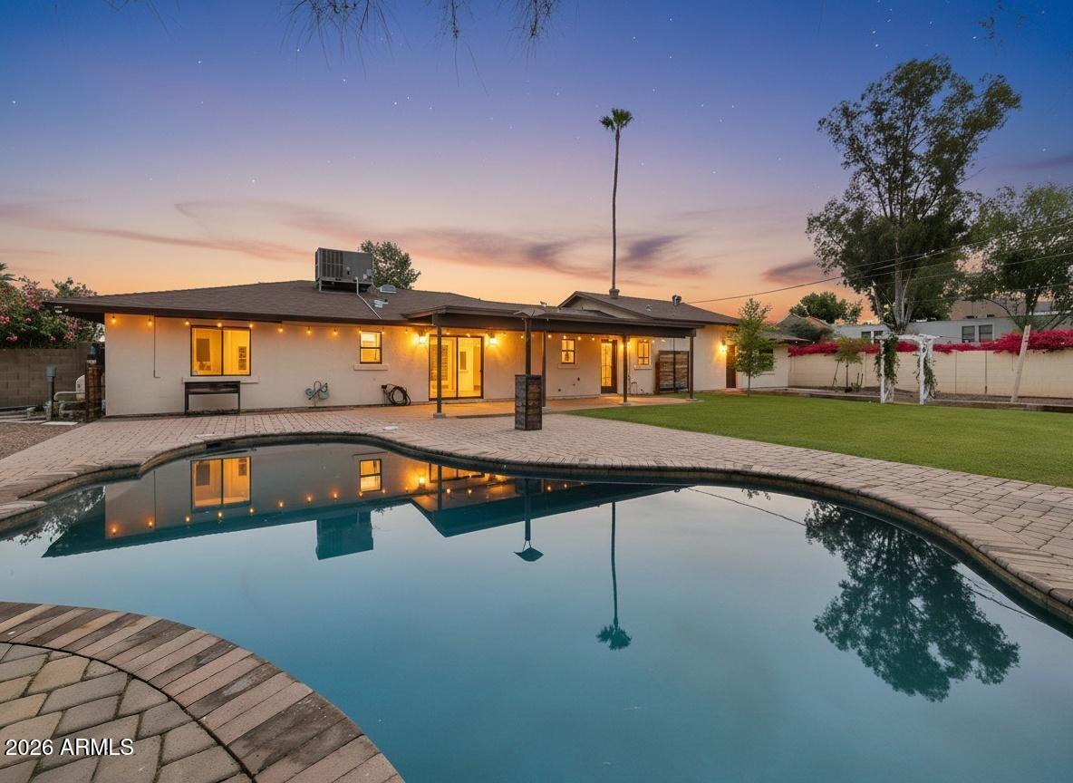 1832 West Northview Avenue Phoenix, AZ 85021 - Photo 16 of 17 a swimming pool view with a garden space