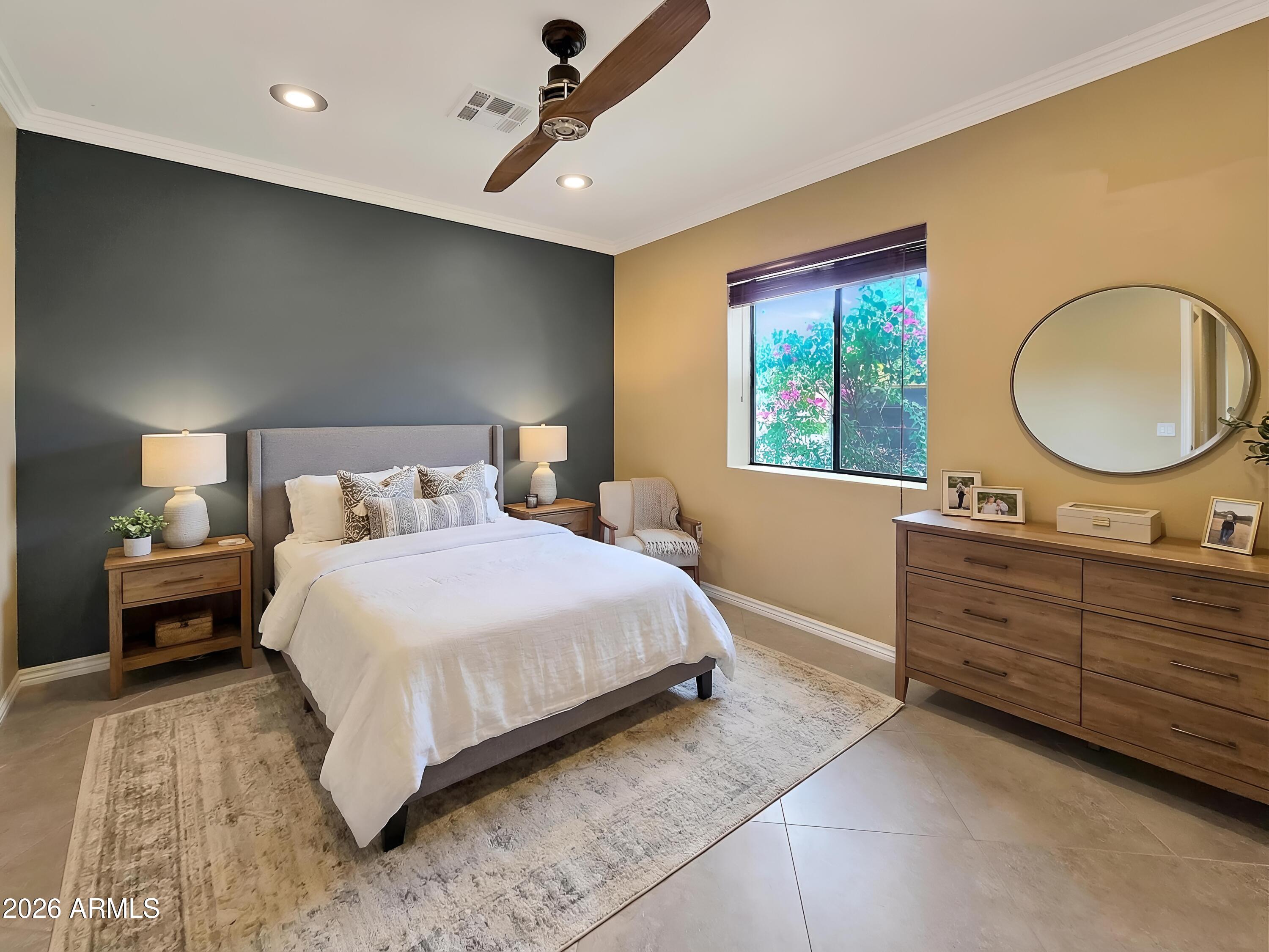 1832 West Northview Avenue Phoenix, AZ 85021 - Photo 8 of 17 a bedroom with a bed and a dresser