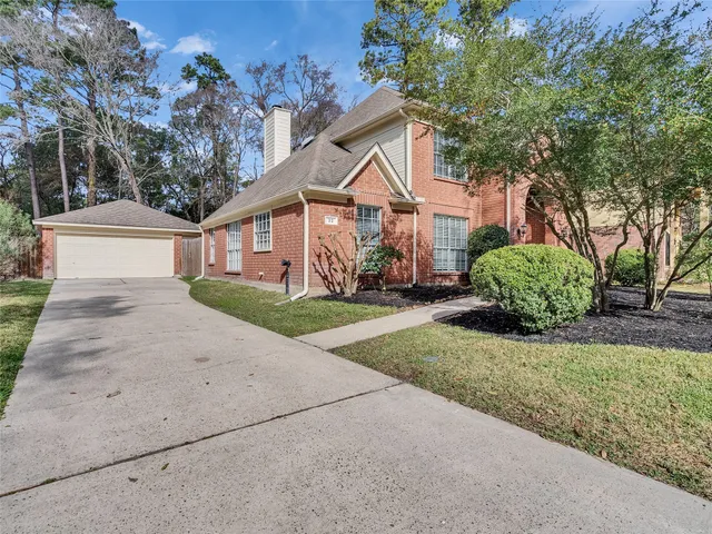 a house with trees in the background