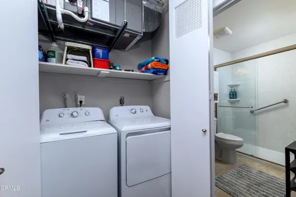 a utility room with dryer and washer