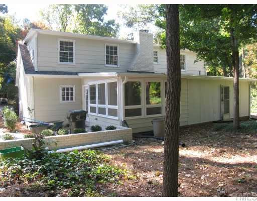704 Davidson Street Raleigh, NC 27609 - Photo 7 of 12 showing back patio, and rear view of house Exterior Back