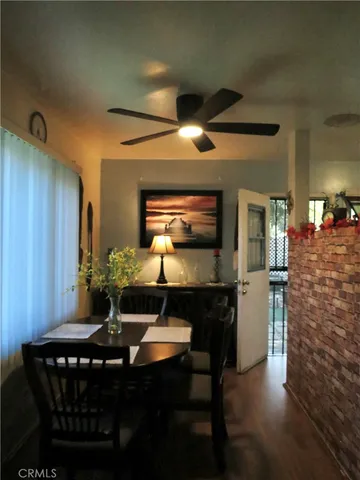 a kitchen with a sink a stove and cabinets