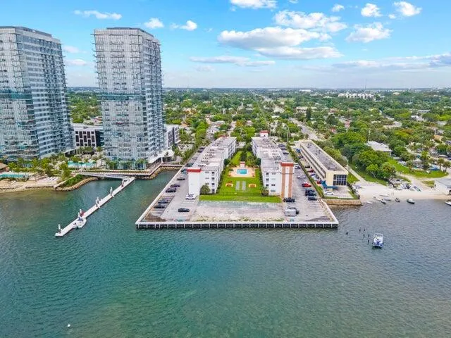 a view of a lake with tall buildings