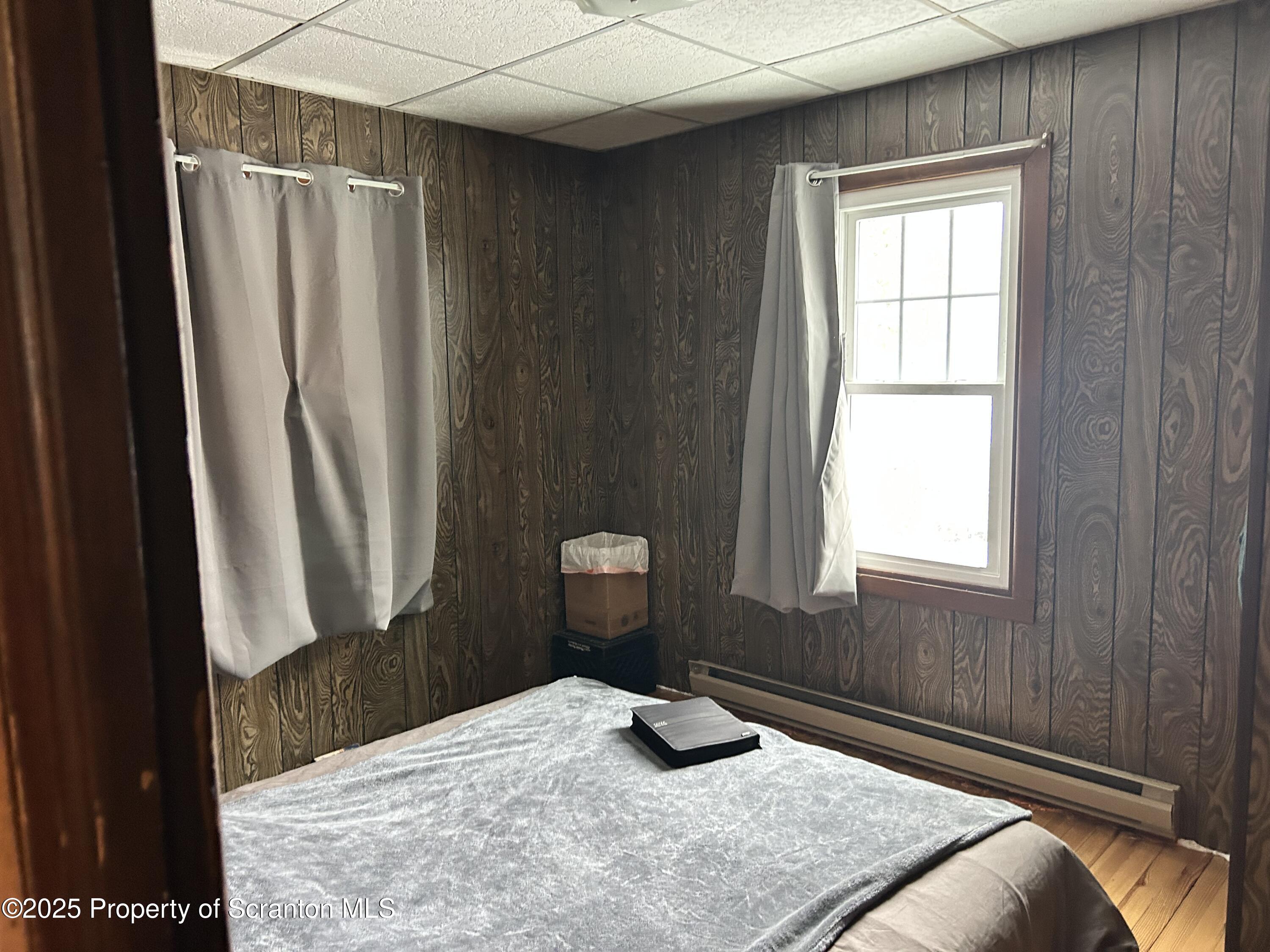 307 Valley Lane Nicholson, PA 18446 - Photo 12 of 16 a bedroom with a bed and a window