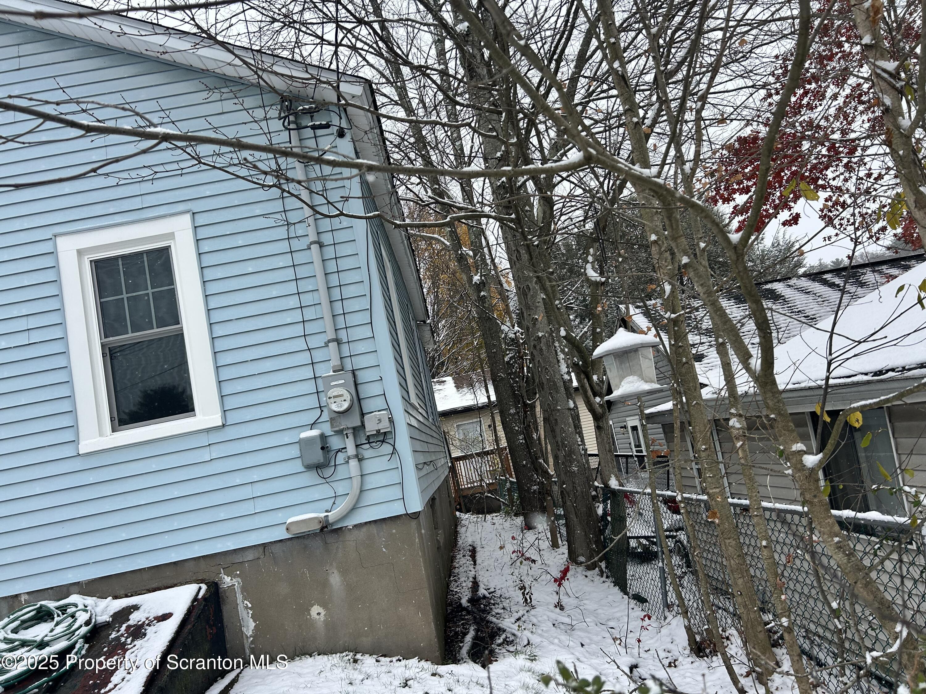 307 Valley Lane Nicholson, PA 18446 - Photo 4 of 16 a backyard of a house with lots of trees