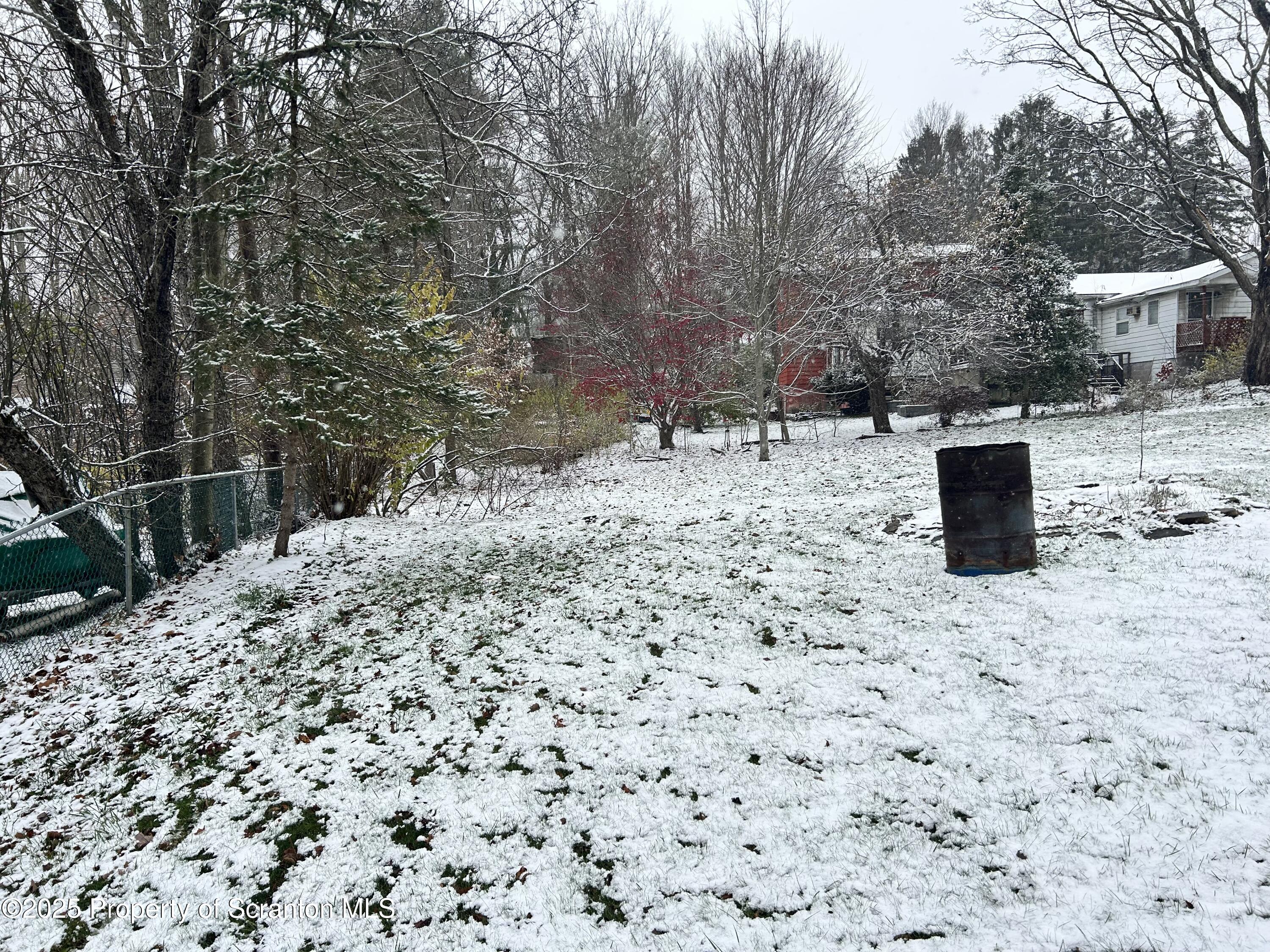 307 Valley Lane Nicholson, PA 18446 - Photo 5 of 16 a view of a dry yard with trees