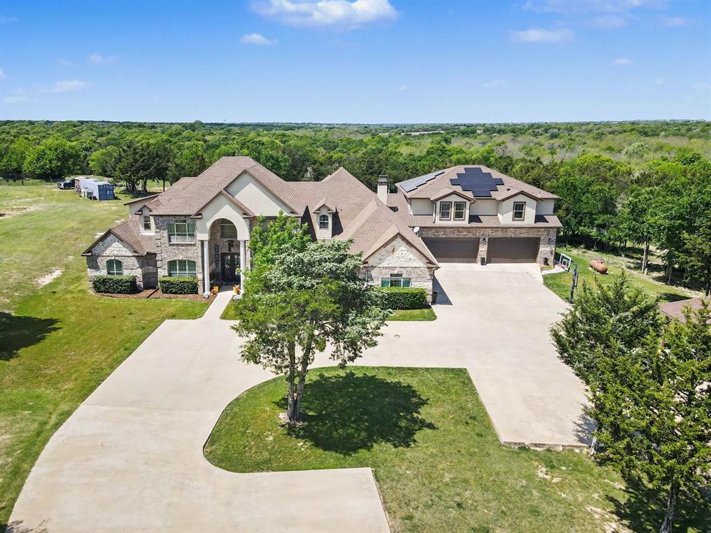 505 South Bluegrove Road Lancaster, TX 75146 - Photo 1 of 37 a front view of a house with a yard