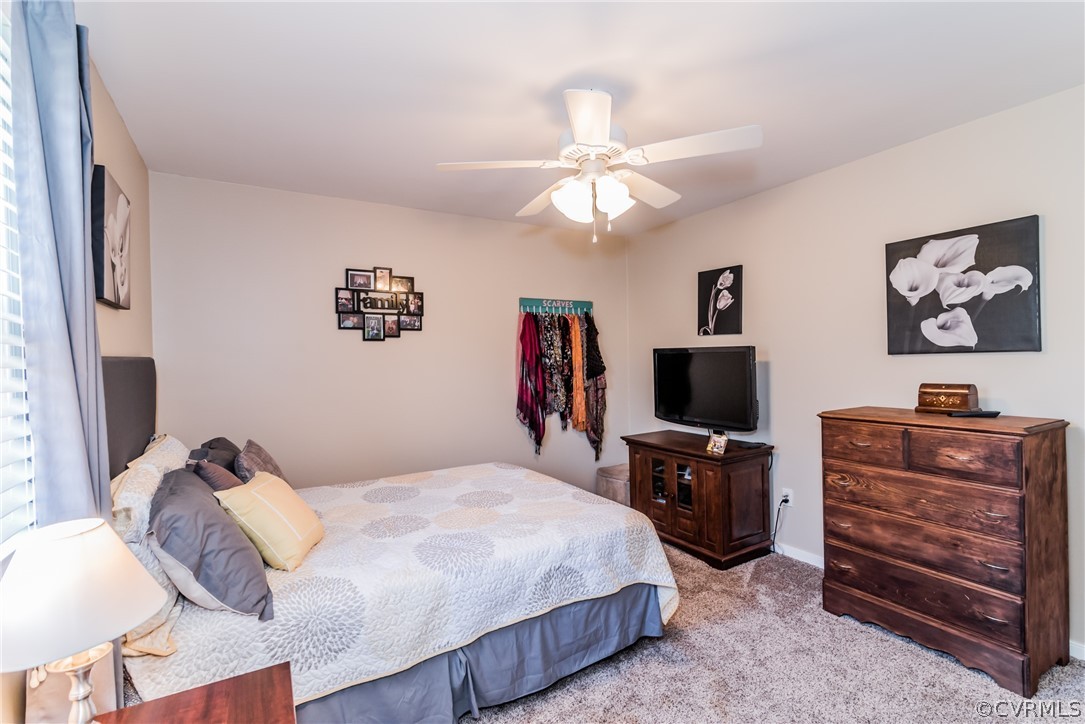 10941 River Road Chesterfield, VA 23838 - Photo 33 of 50 a bedroom with a bed and furniture