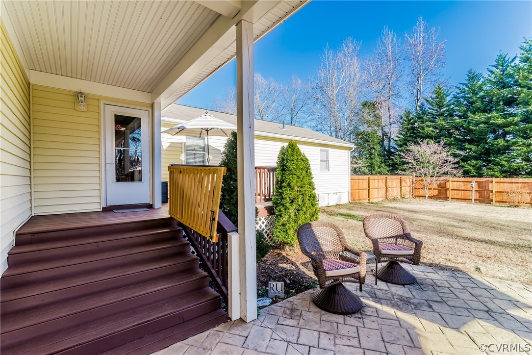 10941 River Road Chesterfield, VA 23838 - Photo 46 of 50 a view of a chair and tables in the balcony