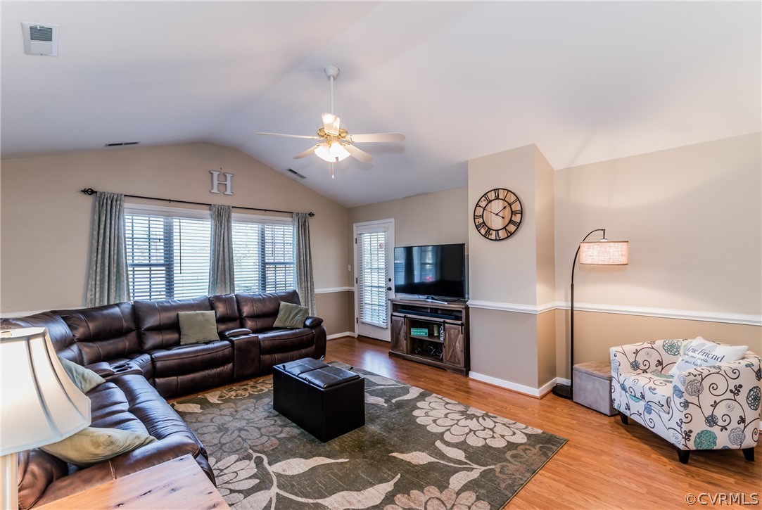 10941 River Road Chesterfield, VA 23838 - Photo 10 of 50 a living room with furniture a flat screen tv and a window