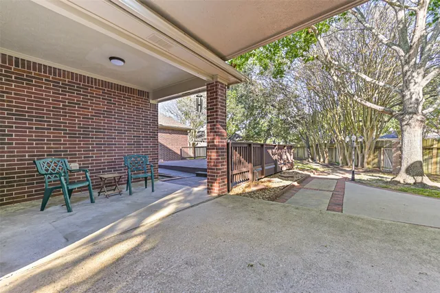 a view of a wooden deck with a bench