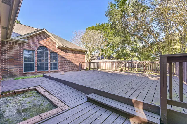 a view of a house with a wooden floor