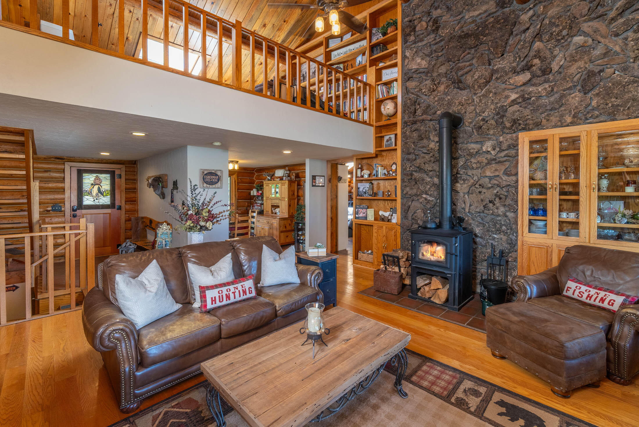 32907 River Bend Road Chiloquin, OR 97624 - Photo 2 of 83 a living room with furniture and a fireplace