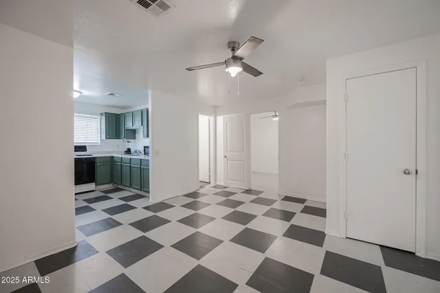 a view of a storage & utility room with a sink