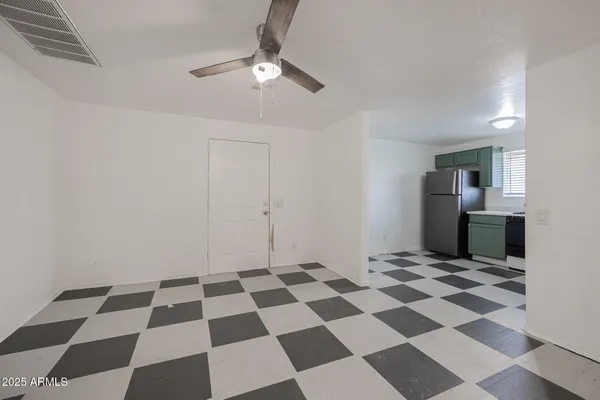 a black and white checkered floor with a black white checkered floor