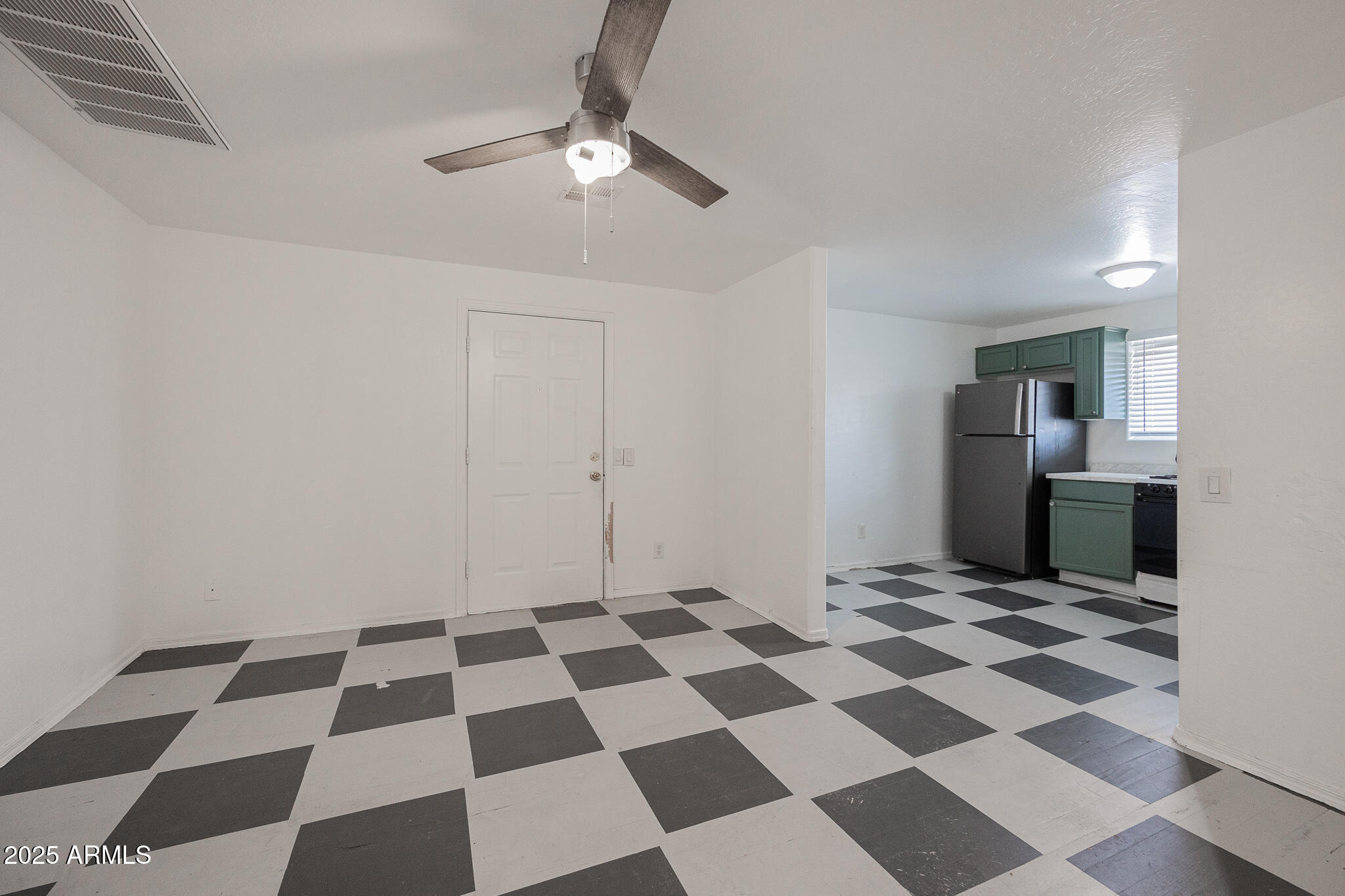 212 North 21st Avenue, Unit 4 Phoenix, AZ 85009 - Photo 4 of 15 a black and white checkered floor with a black white checkered floor