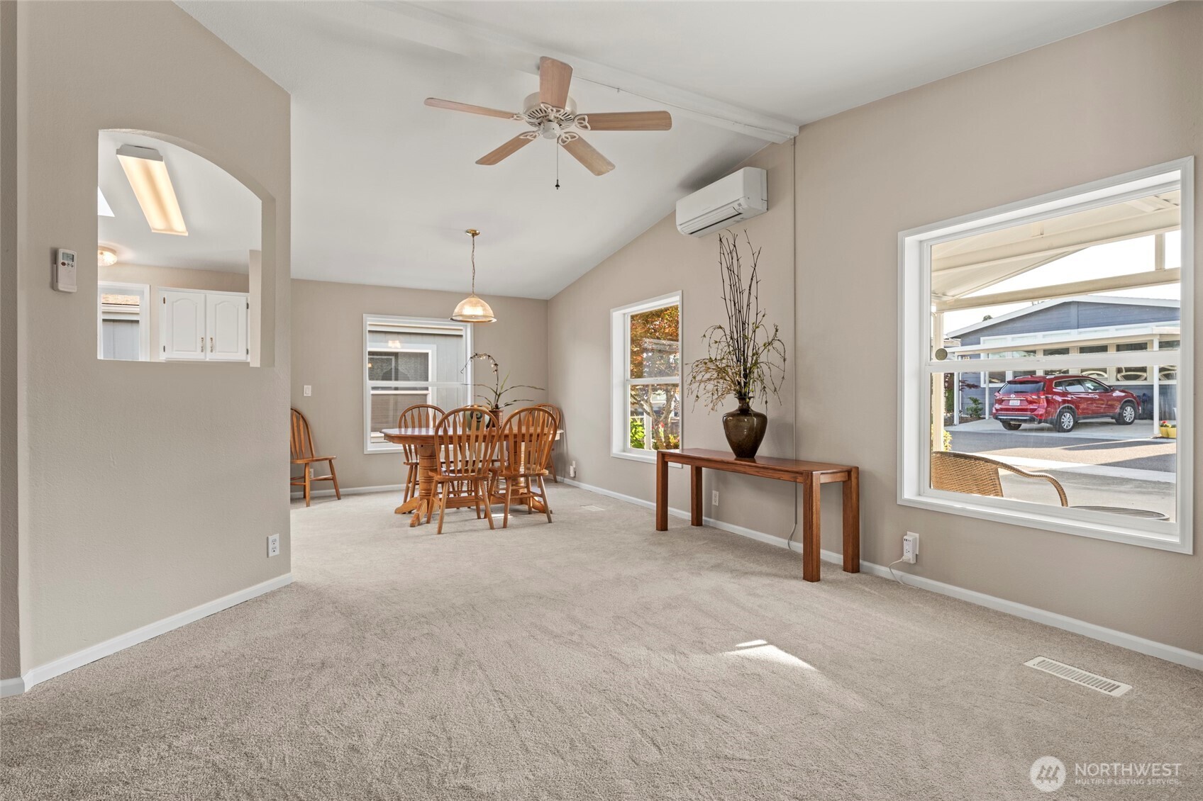 23825 15th Avenue Southeast, Unit 108 Bothell, WA 98021 - Photo 6 of 39 a living room with furniture and a window