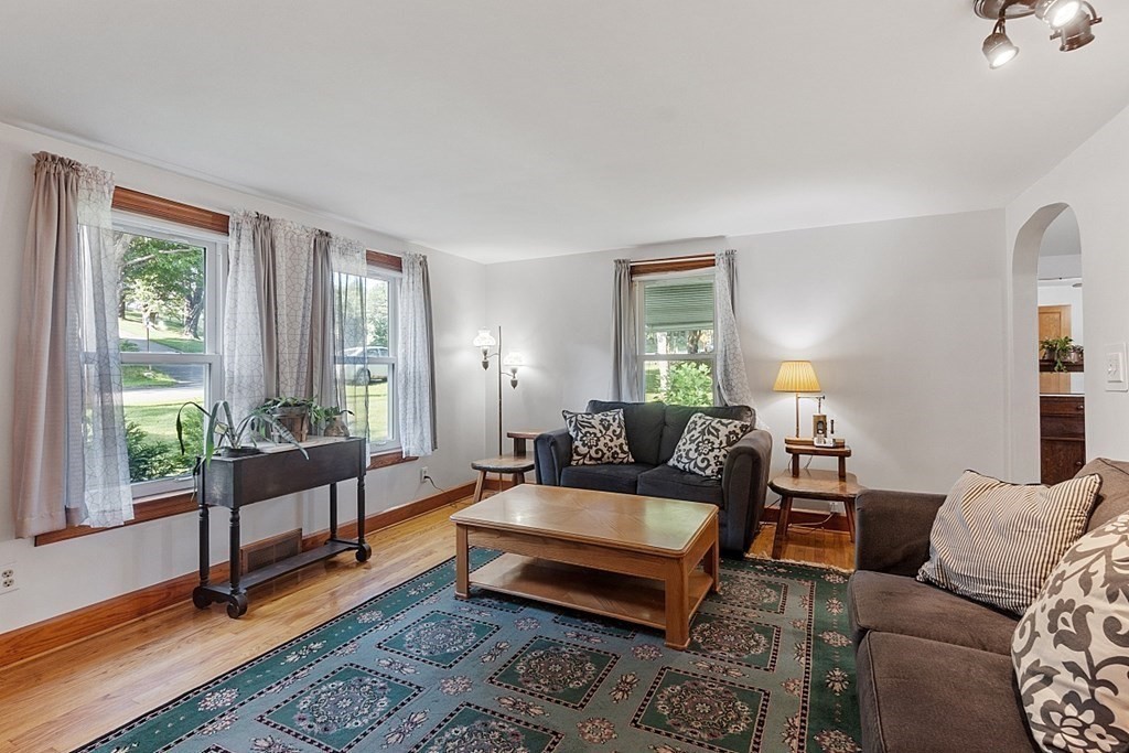 322 Patriots Road Templeton, MA 01468 - Photo 11 of 42 a living room with furniture and a window
