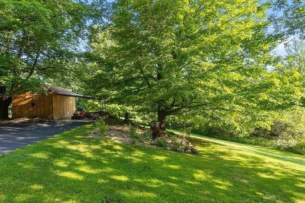 322 Patriots Road Templeton, MA 01468 - Photo 27 of 42 a view of a back yard
