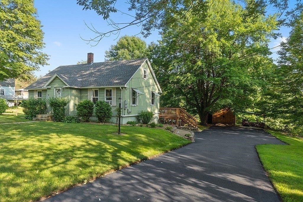 322 Patriots Road Templeton, MA 01468 - Photo 40 of 42 a view of a house with a yard