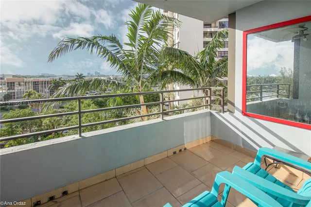 a view of balcony with a potted plant