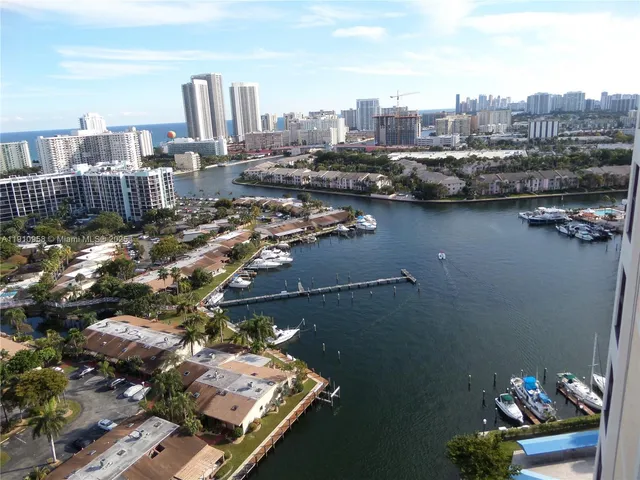 a view of a water fountain in front of a house