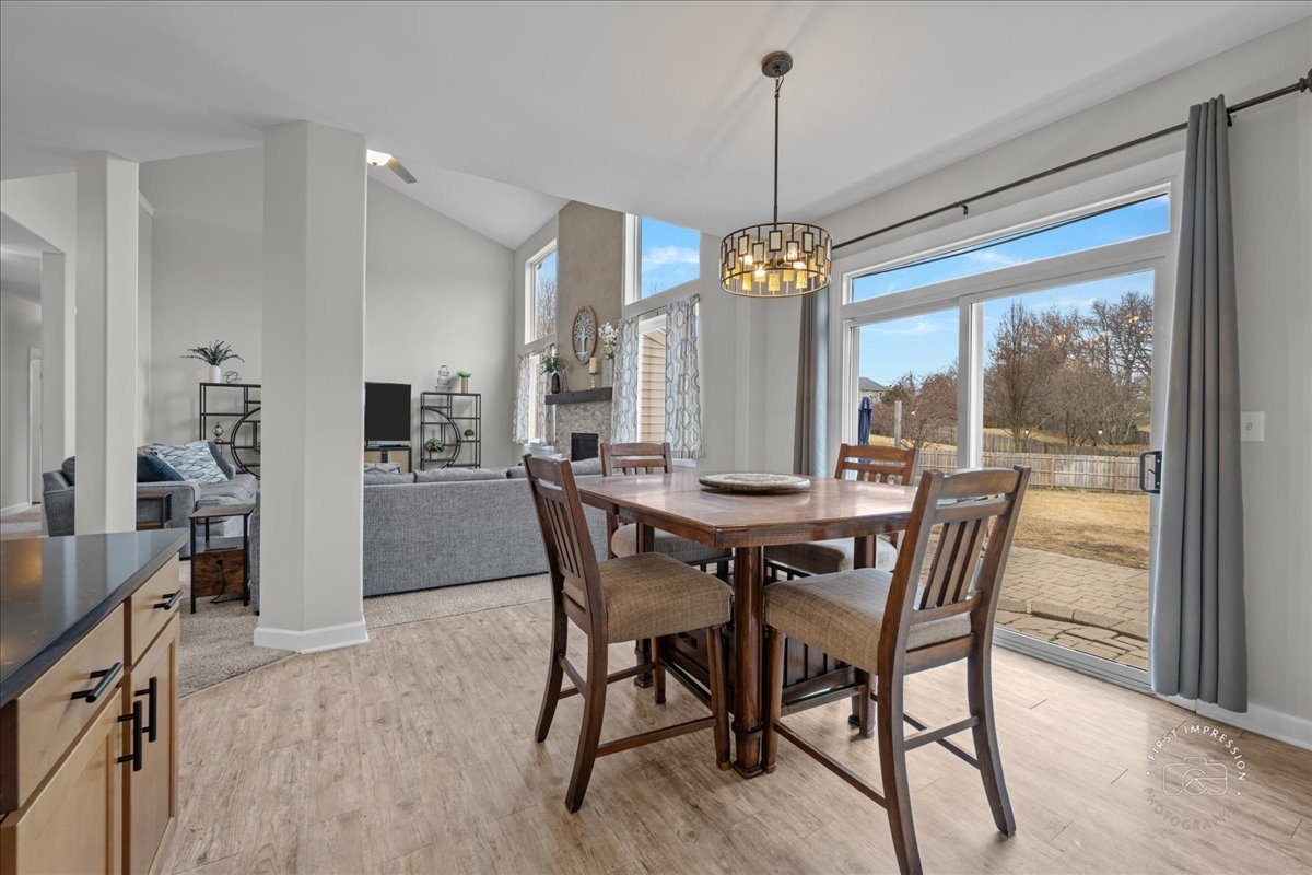 2924 Bauer Road North Aurora, IL 60542 - Photo 15 of 33 a dining room with furniture window and wooden floor