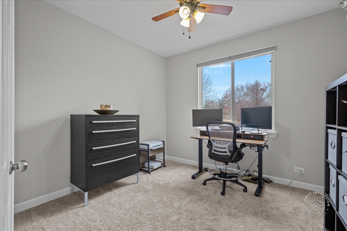 2924 Bauer Road North Aurora, IL 60542 - Photo 17 of 33 a view of a workspace with furniture and a window