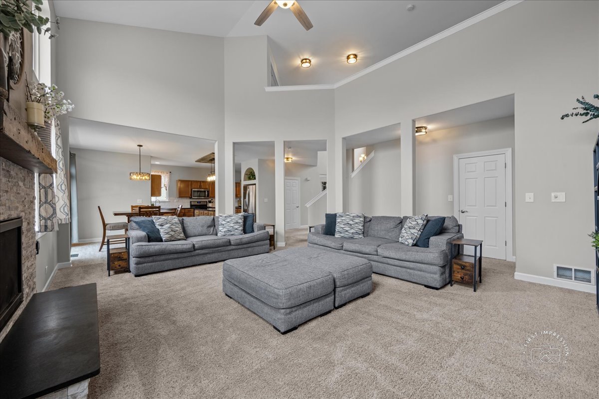 2924 Bauer Road North Aurora, IL 60542 - Photo 6 of 33 a living room with furniture and a fireplace