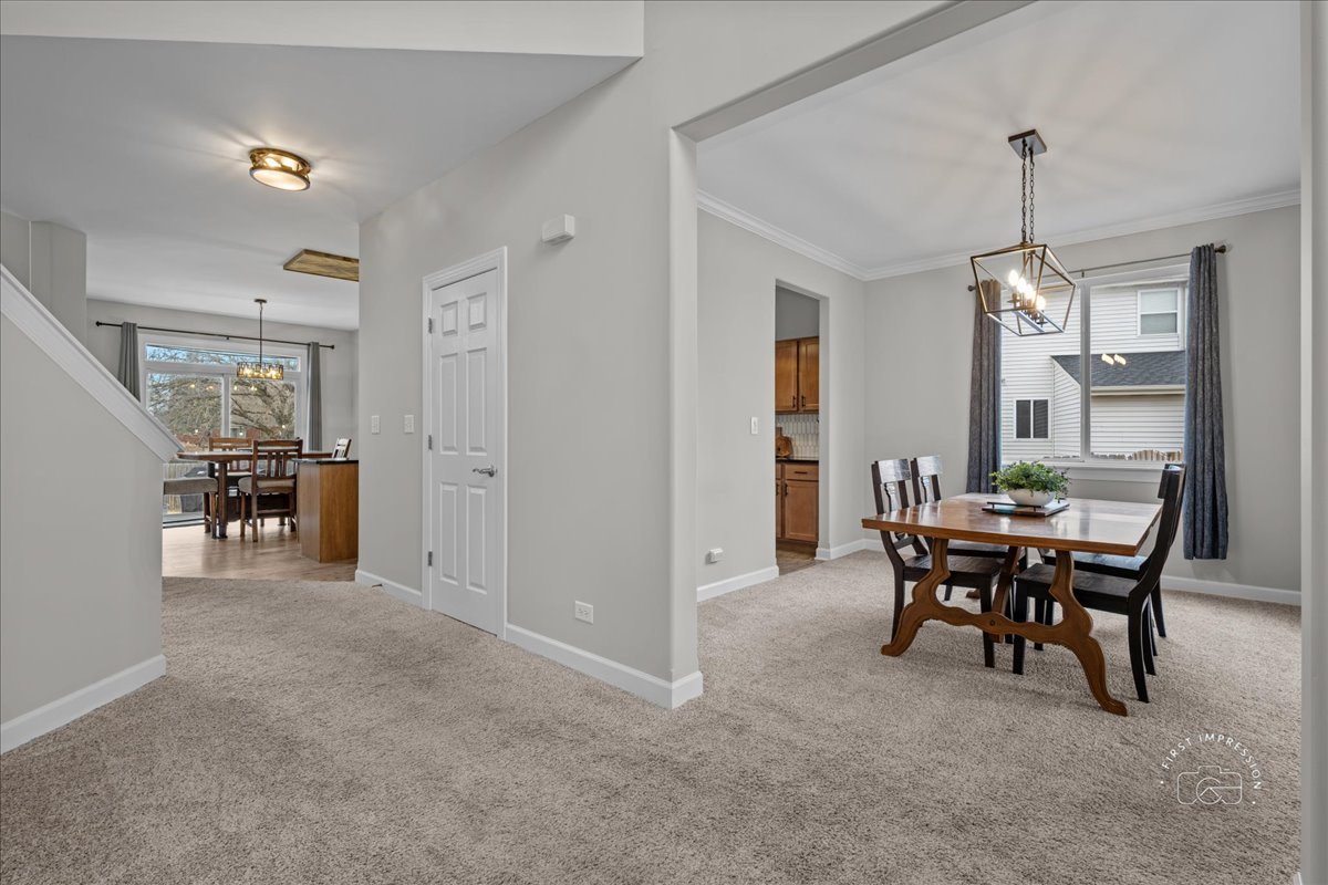2924 Bauer Road North Aurora, IL 60542 - Photo 9 of 33 a view of a dining room with furniture window and wooden floor